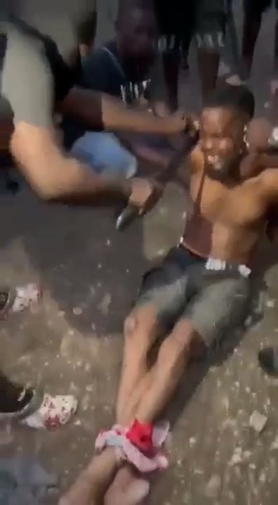 Haitian Man Gets Mutilated And Dismembered Alive — video thumbnail for 5bda8998ba01874fd1217860f340a68c.mp4